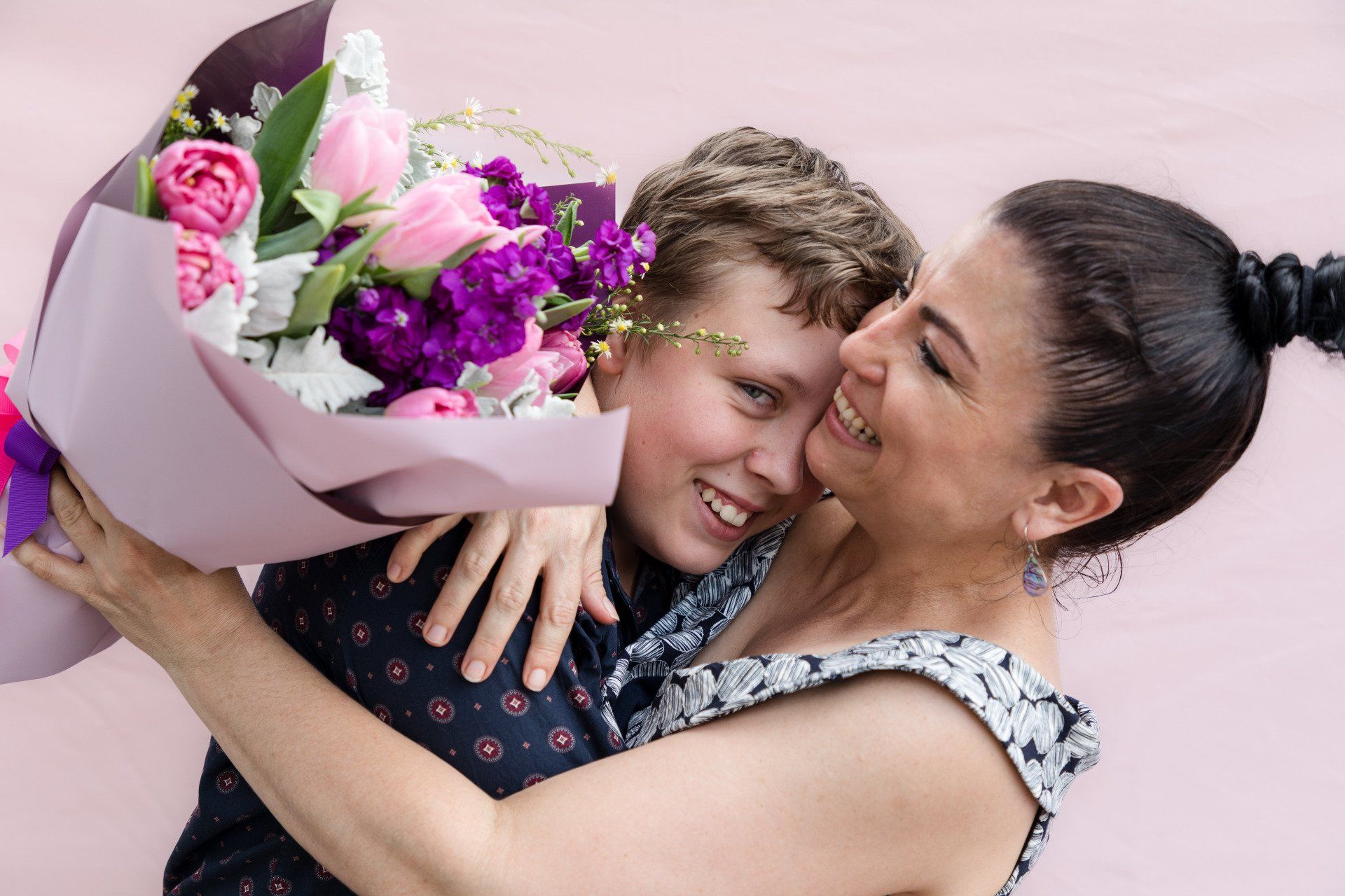 Warm and inviting family portrait, encapsulating love and joy, perfect for Darwin flower delivery occasions.