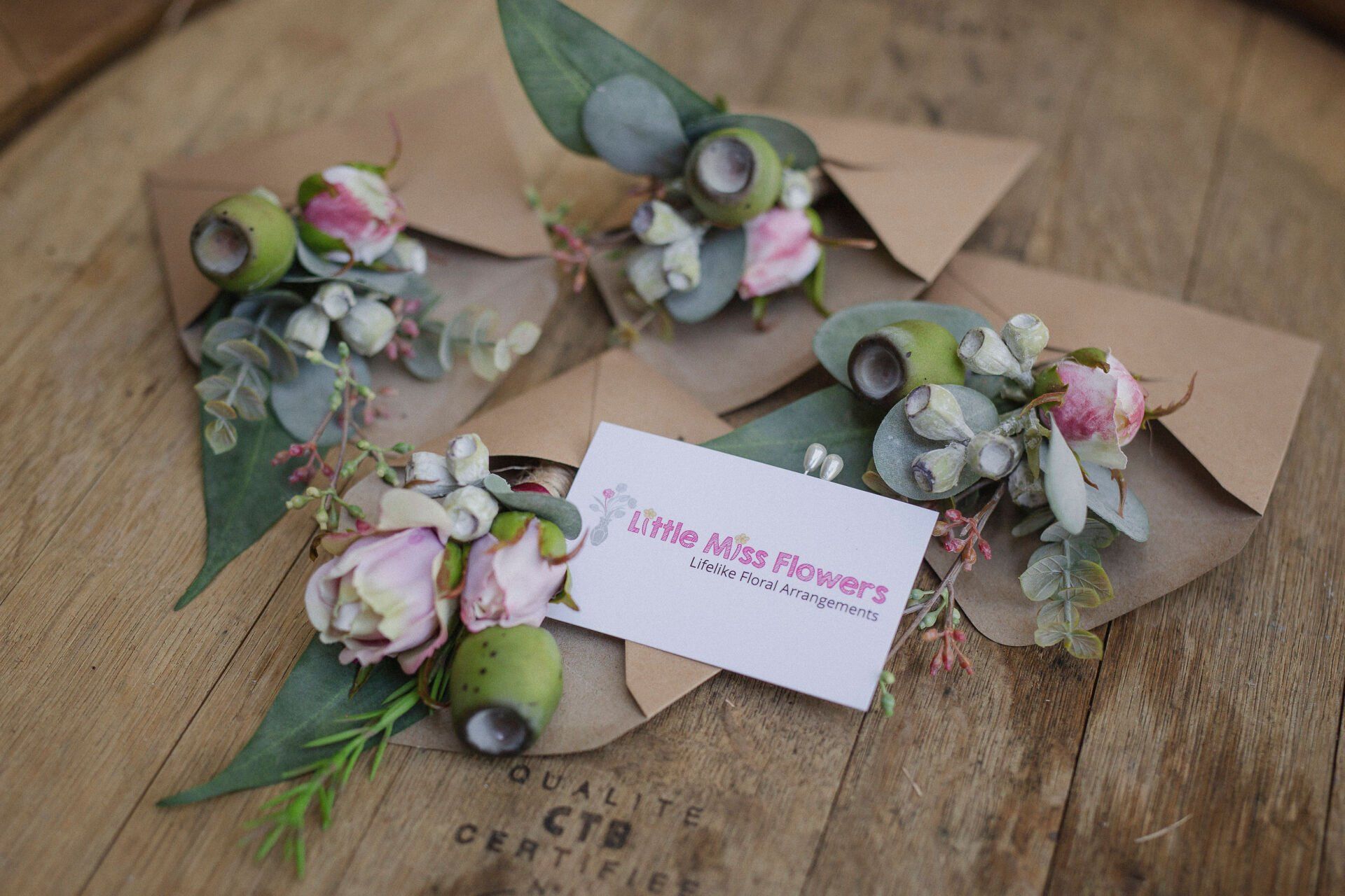 hic floral accents for groomsmen's attire, courtesy of Darwin's finest flower shop.