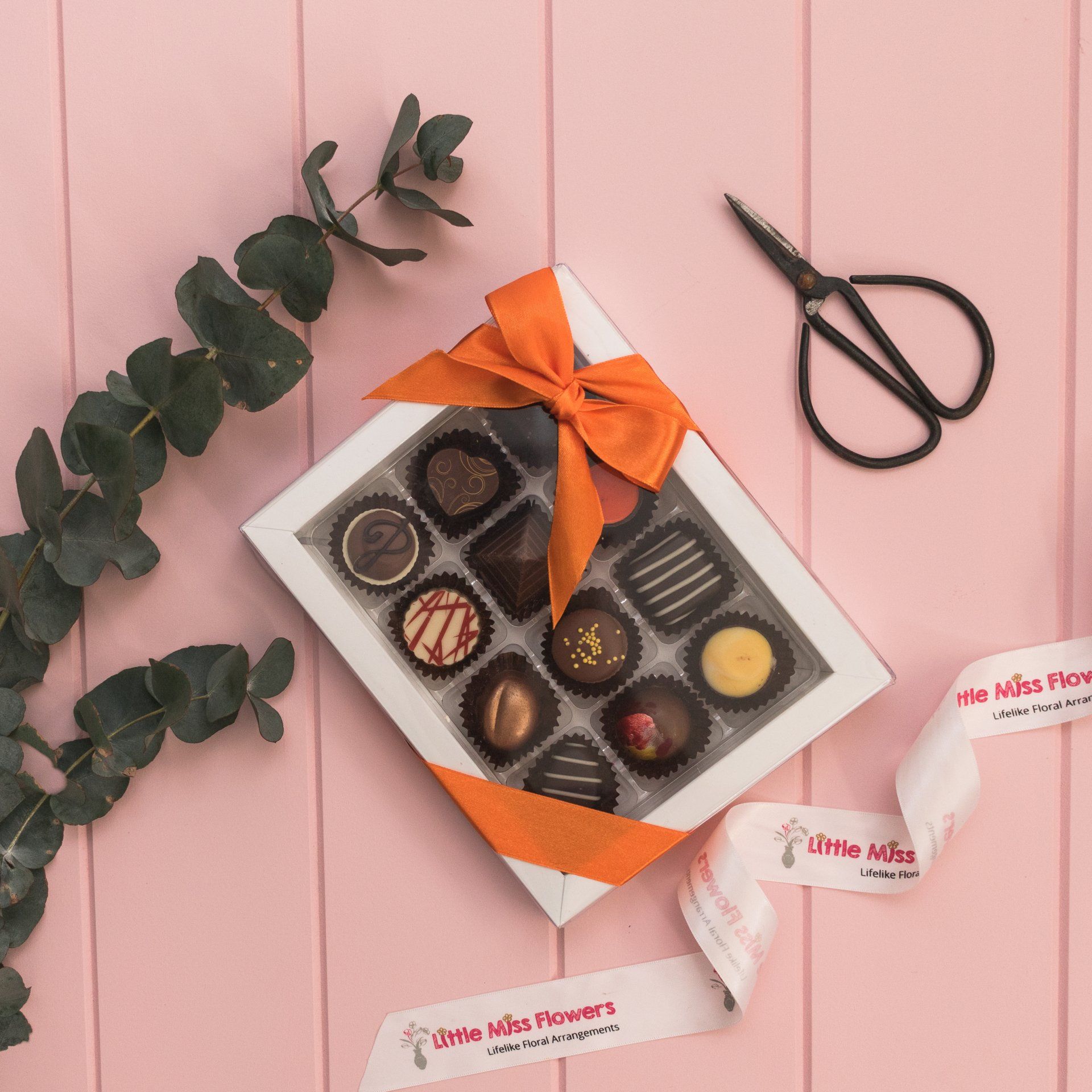 Fine chocolates arranged by Darwin's florist, a sweet complement to flowers.