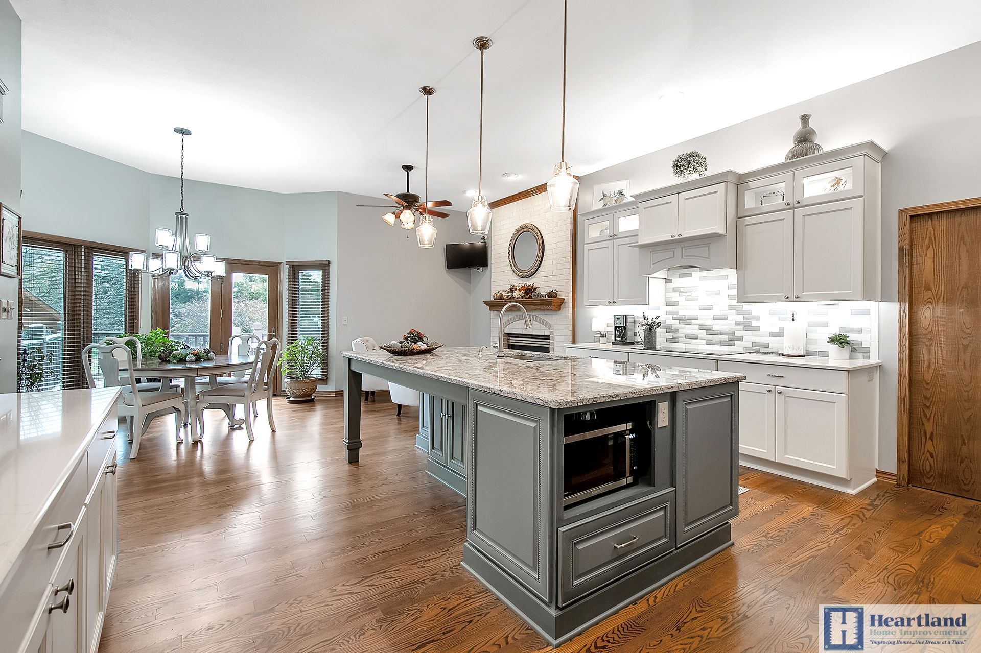 There is a large island in the middle of the kitchen.