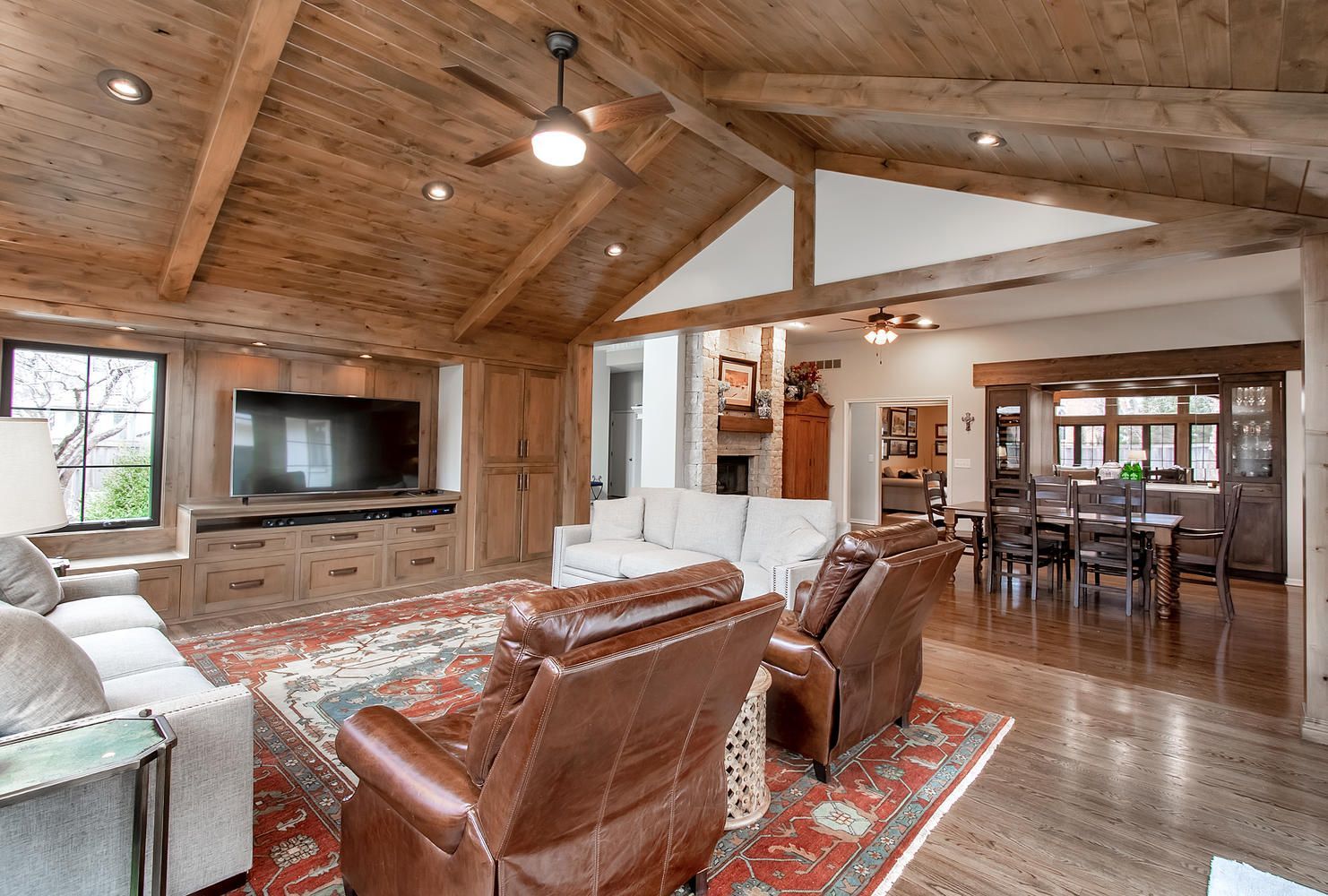 A living room filled with furniture and a flat screen tv.