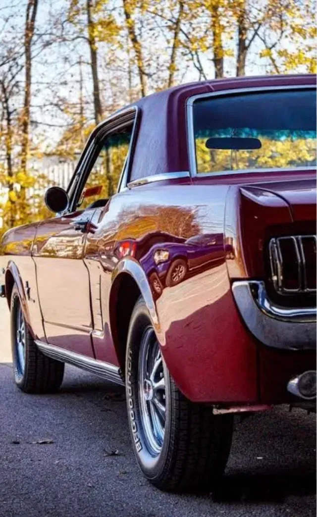 Maroon Classic Coupe Parked Outdoors | DTM Autowerks