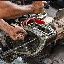 Man Work In Progress Car Repair — Kingsley, MI — BC Transmission Man Work In Progress Car Repair — Kingsley, MI — BC Transmission