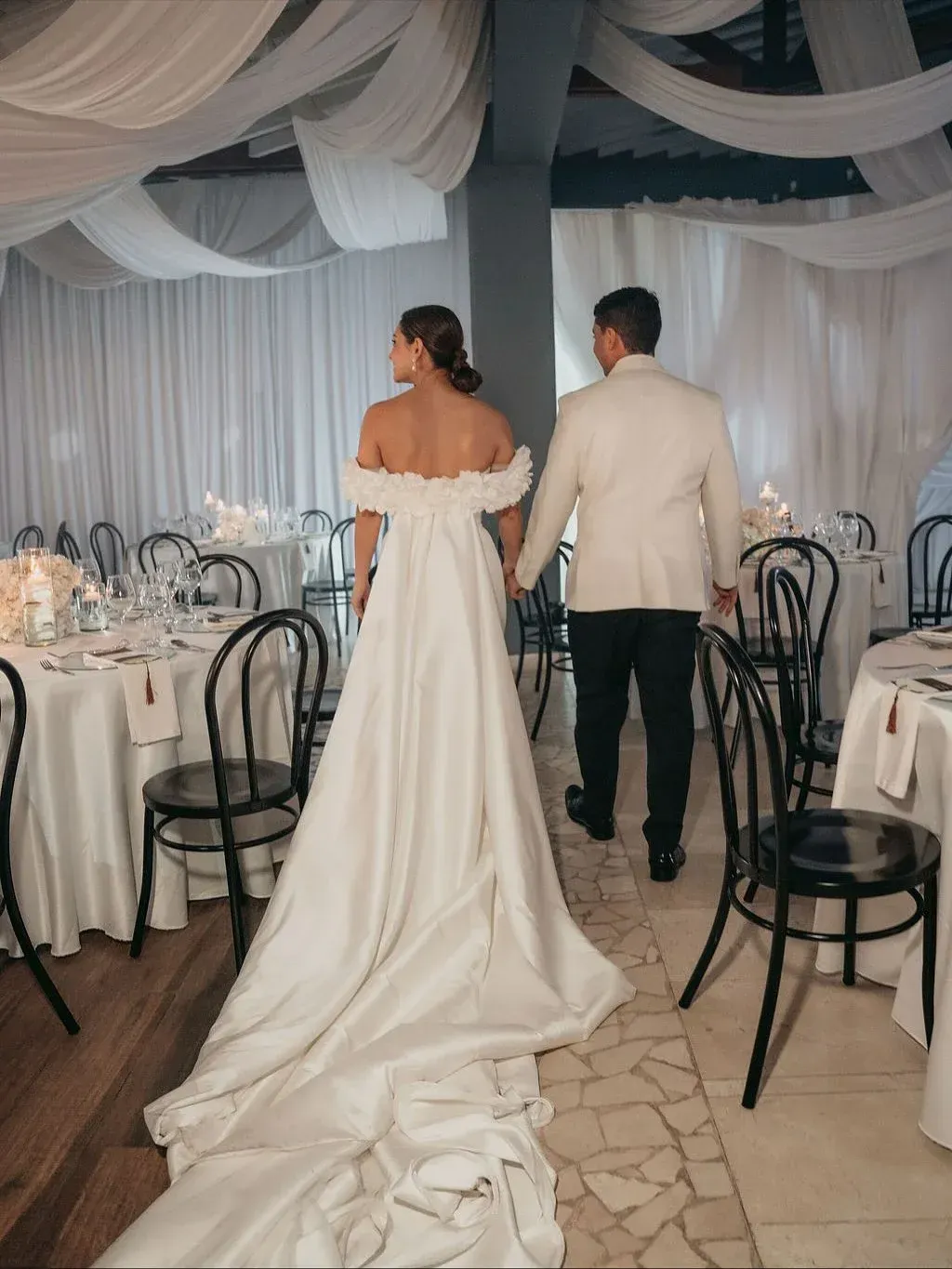 Bride and groom entering the main hall at a wedding in Manizales, social event at a convention center in Manizales