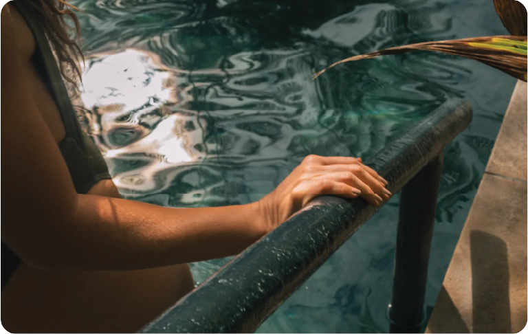 Woman in a thermal pool at Termales El Otoño, a hot springs hotel near Manizales, Colombia.