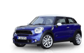 A blue mini cooper countryman is shown on a white background | Collins Automotive
