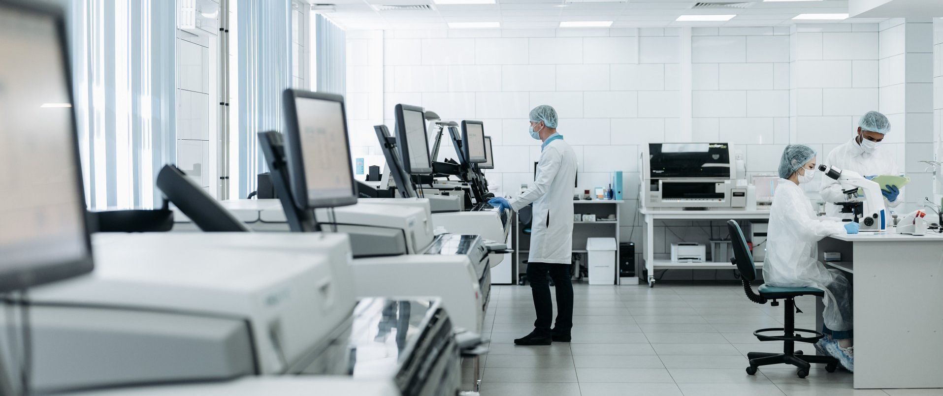 A group of scientists are working in a laboratory.