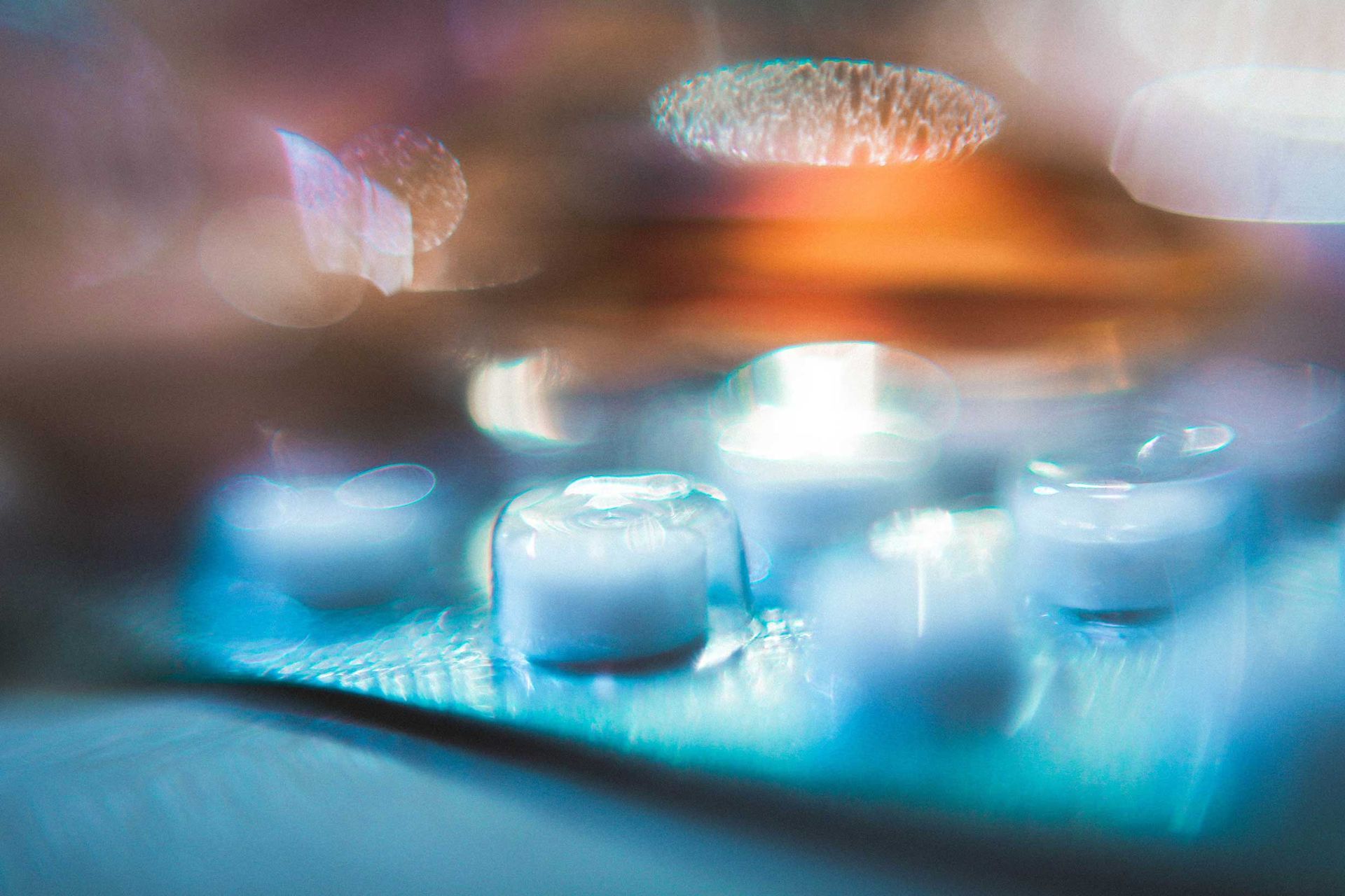 A close up of a blister pack of pills on a table.