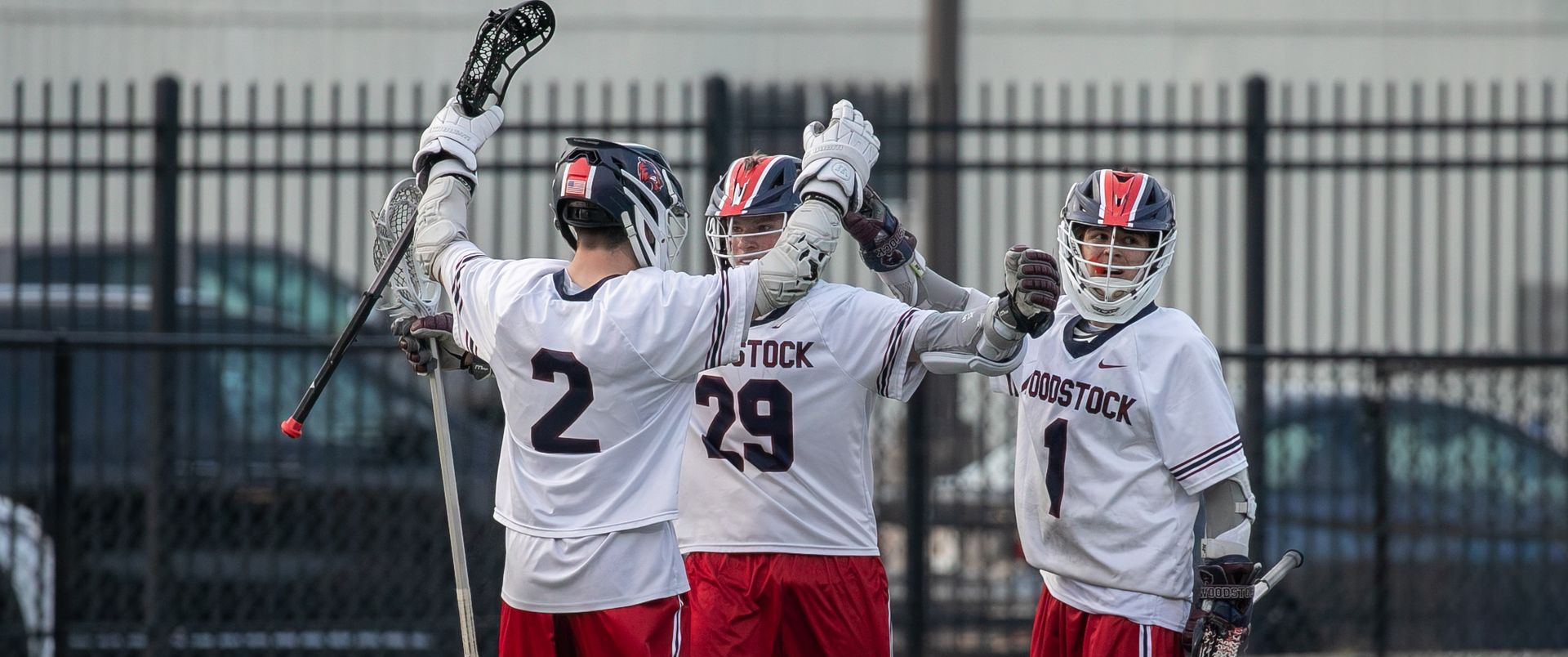 Lacrosse players preparing for a Sunday game