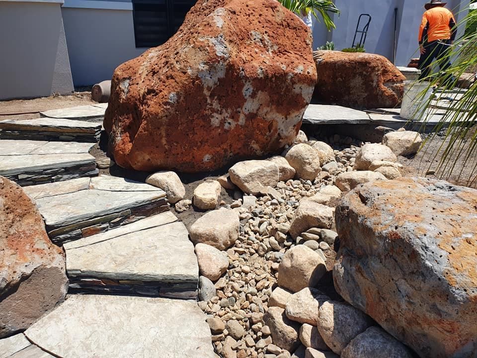 A Rocky Landscape Path With Large Boulders and Flat Stone Steps — High End Stone Masons in West End, QLD