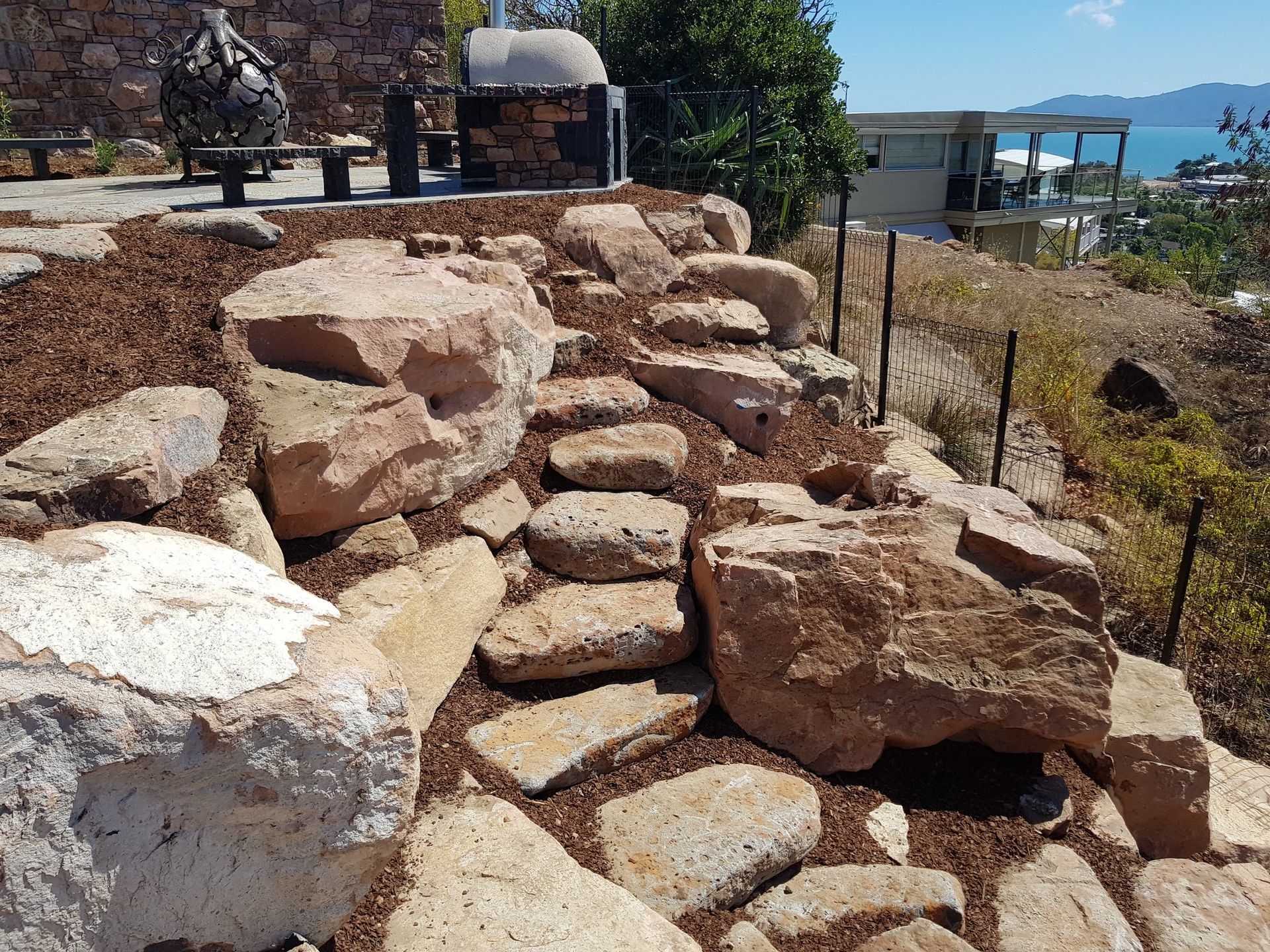 A Stone Staircase Built Into a Hillside Garden — High End Stone Masons in West End, QLD