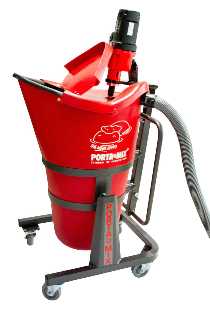 Red mobile industrial vacuum cleaner with hose, wheels, and red lid on a gray stand