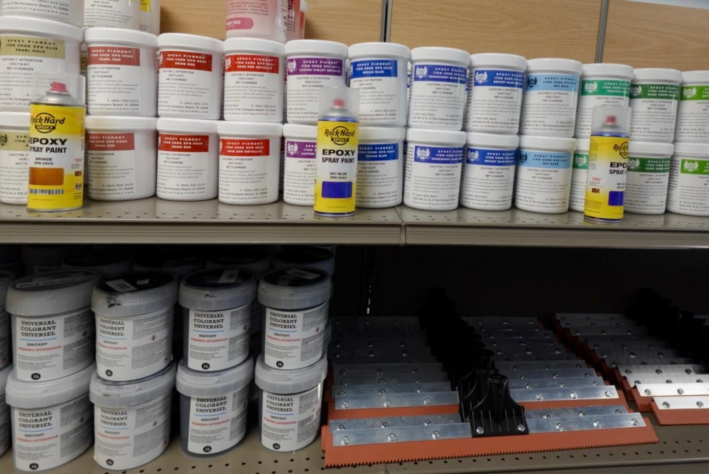Shelves stocked with cans, jars, and boxed goods in a store aisle