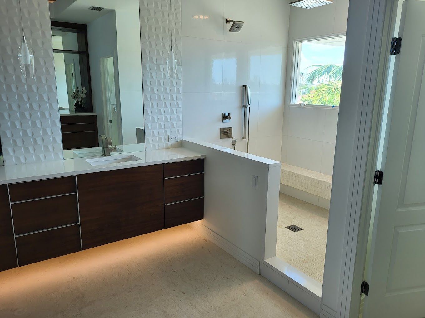 Modern bathroom with double vanity, mirror, and walk-in shower beside a soaking tub