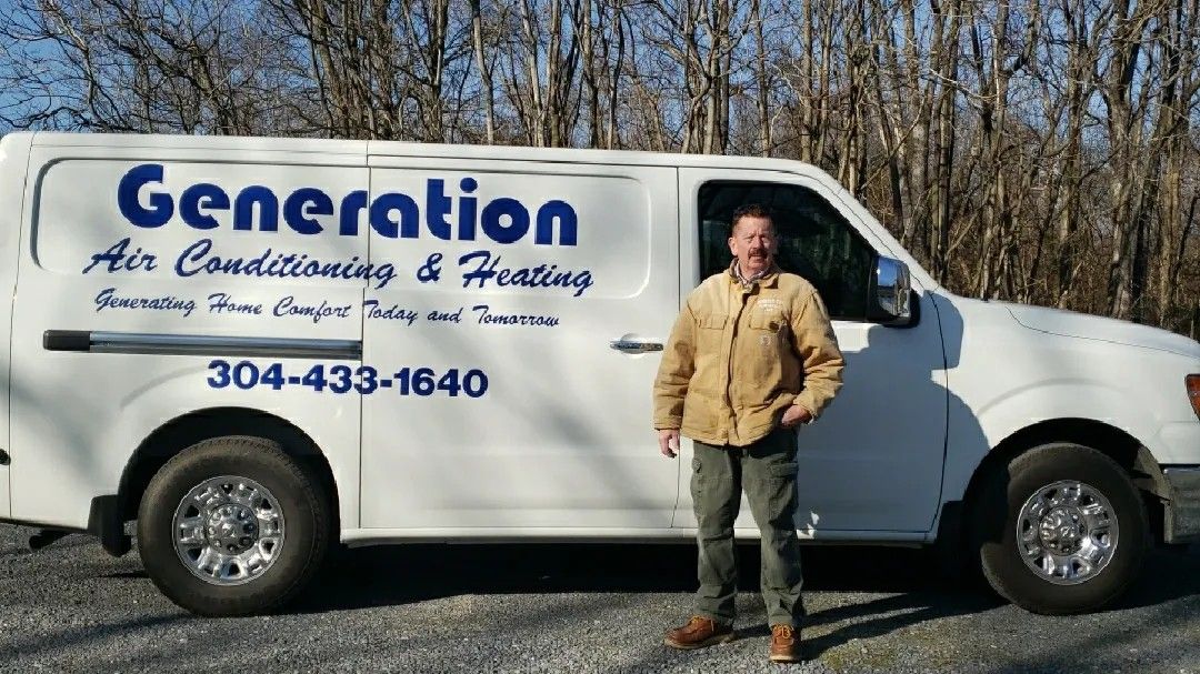 A man is standing in front of a generation air conditioning and heating van.
