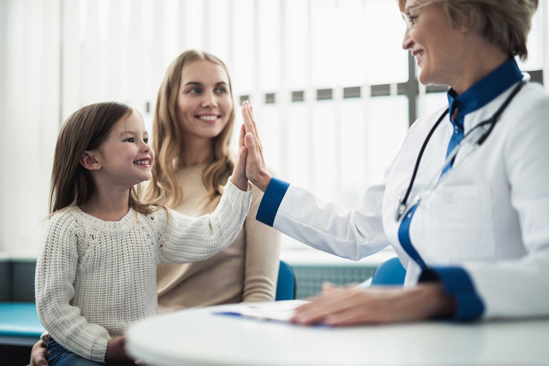 Adult Speech Therapy — Schoolkids Raising Their Hands in Flint Township, MI Adult Speech Therapy — Schoolkids Raising Their Hands in Flint Township, MI