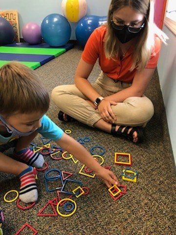 Teacher & Student — Flint Township, MI — The Speech Language Learning Center, Inc