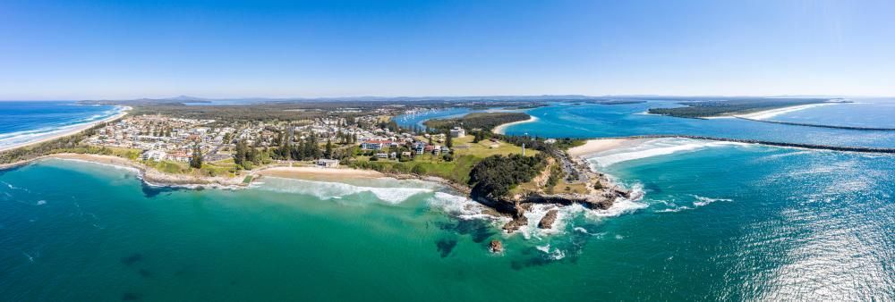 An Aerial View Of A Small Island In The Middle Of The Ocean — The Woolmen In Yamba, NSW