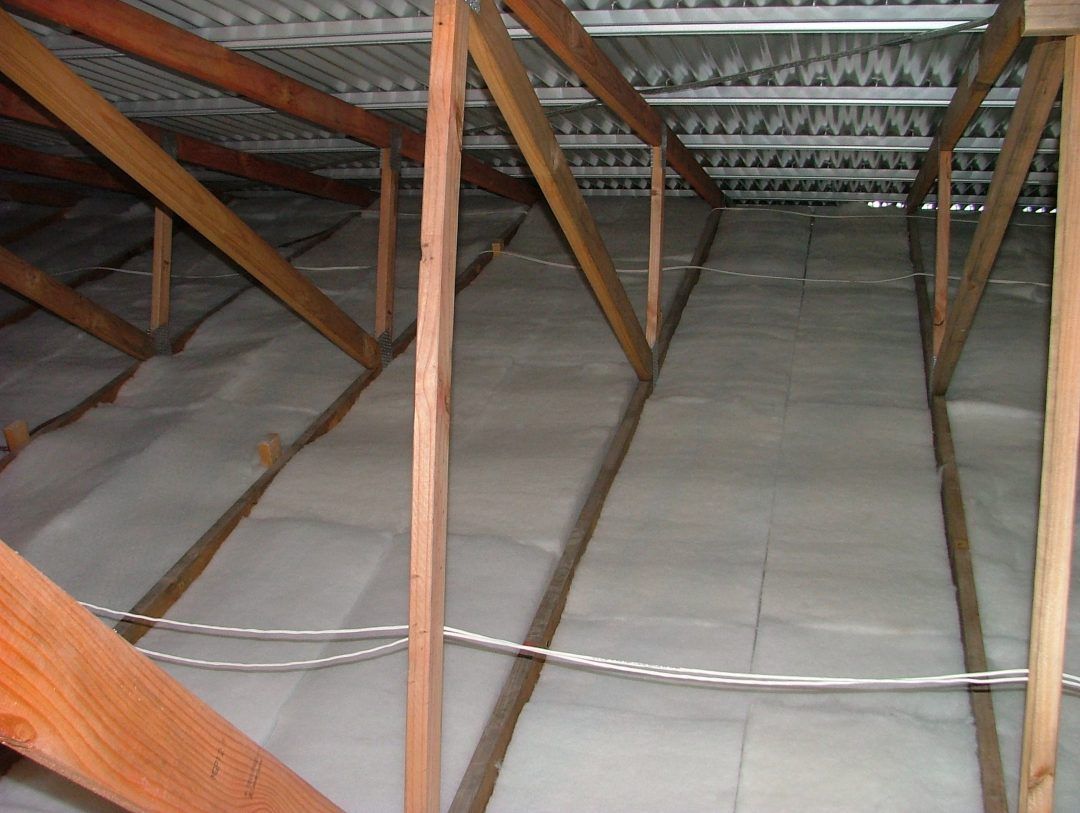 Insulation In An Attic With Wooden Frames — The Woolmen In Lismore, NSW