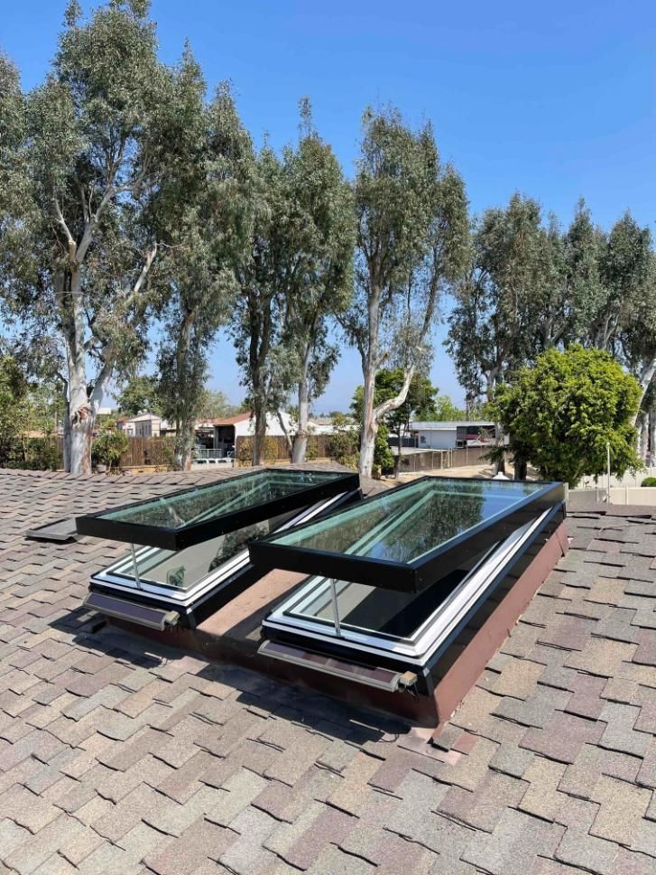 Two Skylights Are Sitting On Top Of A Brick Roof — The Woolmen In Yamba, NSW