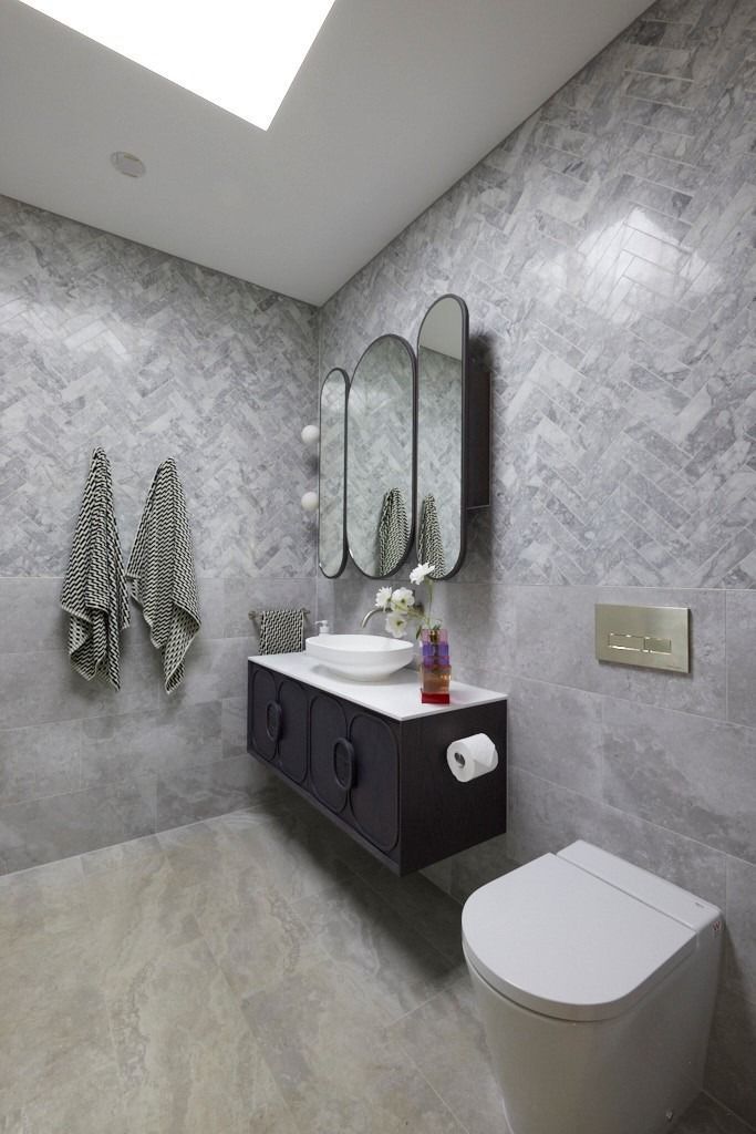 A Bathroom With A Sink , Toilet , Mirror And Skylight — The Woolmen In Alstonville, NSW