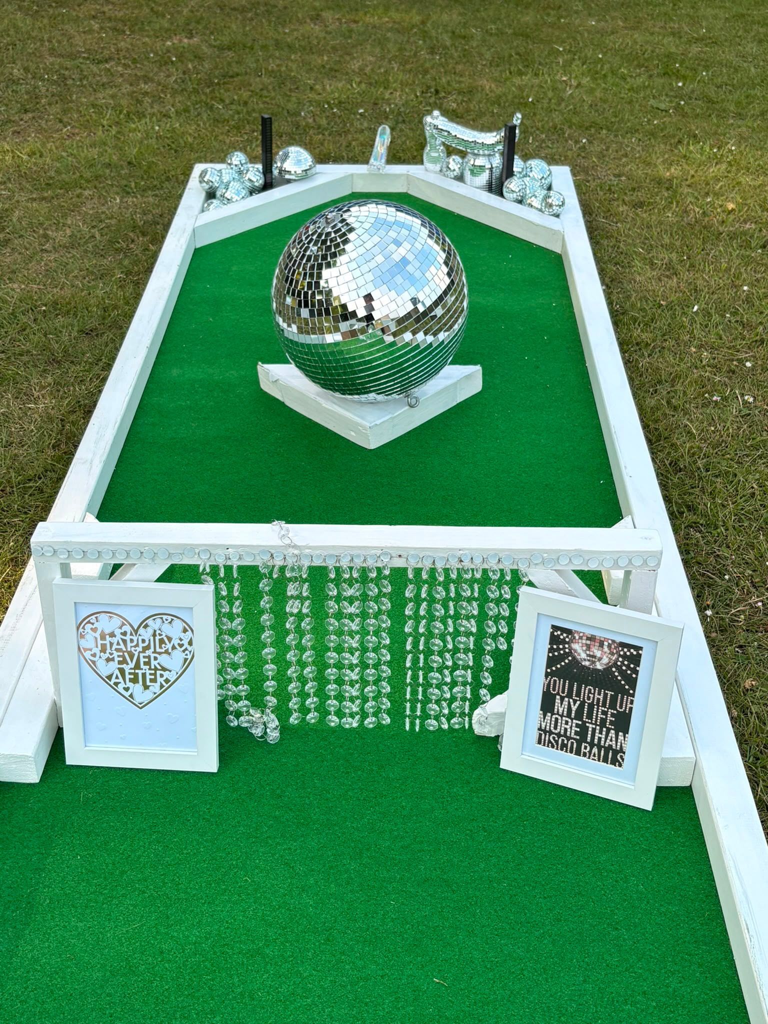 Close-up of a colourful painted mini golf obstacle