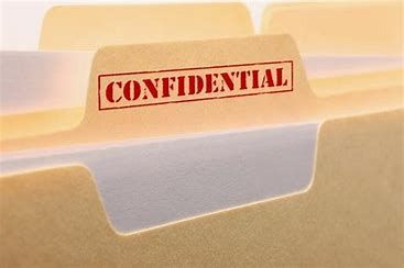 A folder with a label that says confidential on it