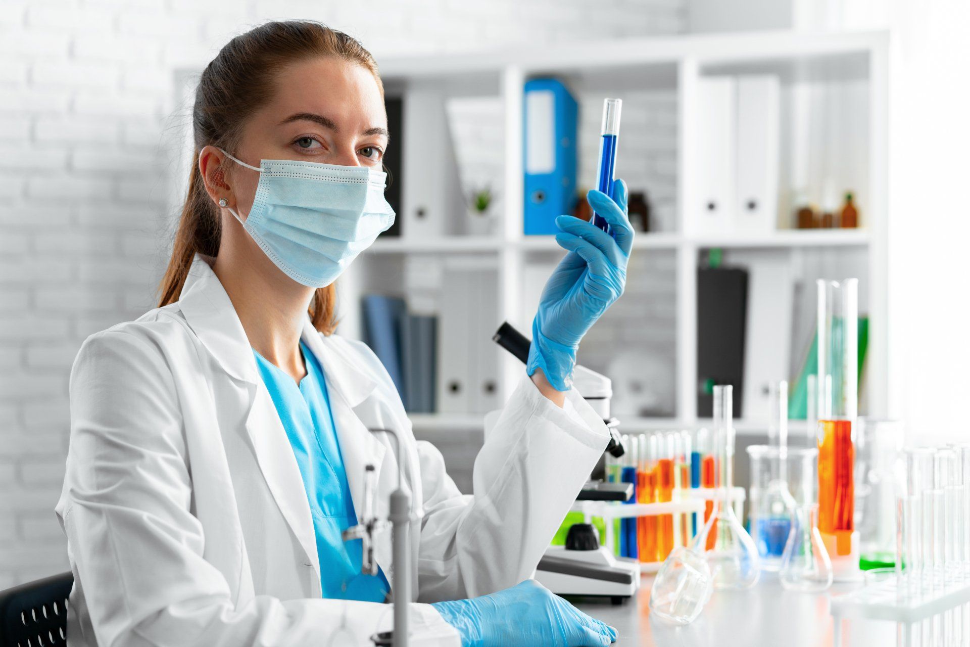 Woman scientist holding test tube