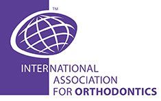 The logo for the international association for orthodontics is purple and white.