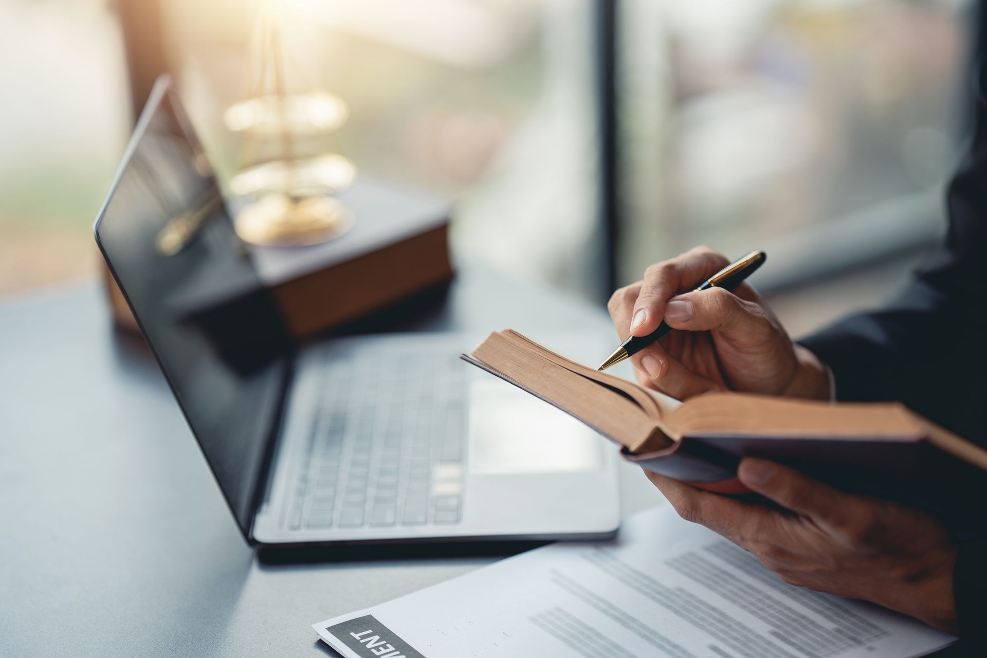 Businessman and lawyer look at contract terms in law, discuss contract document. Treaty Law. Signing a business contract, signing important document.