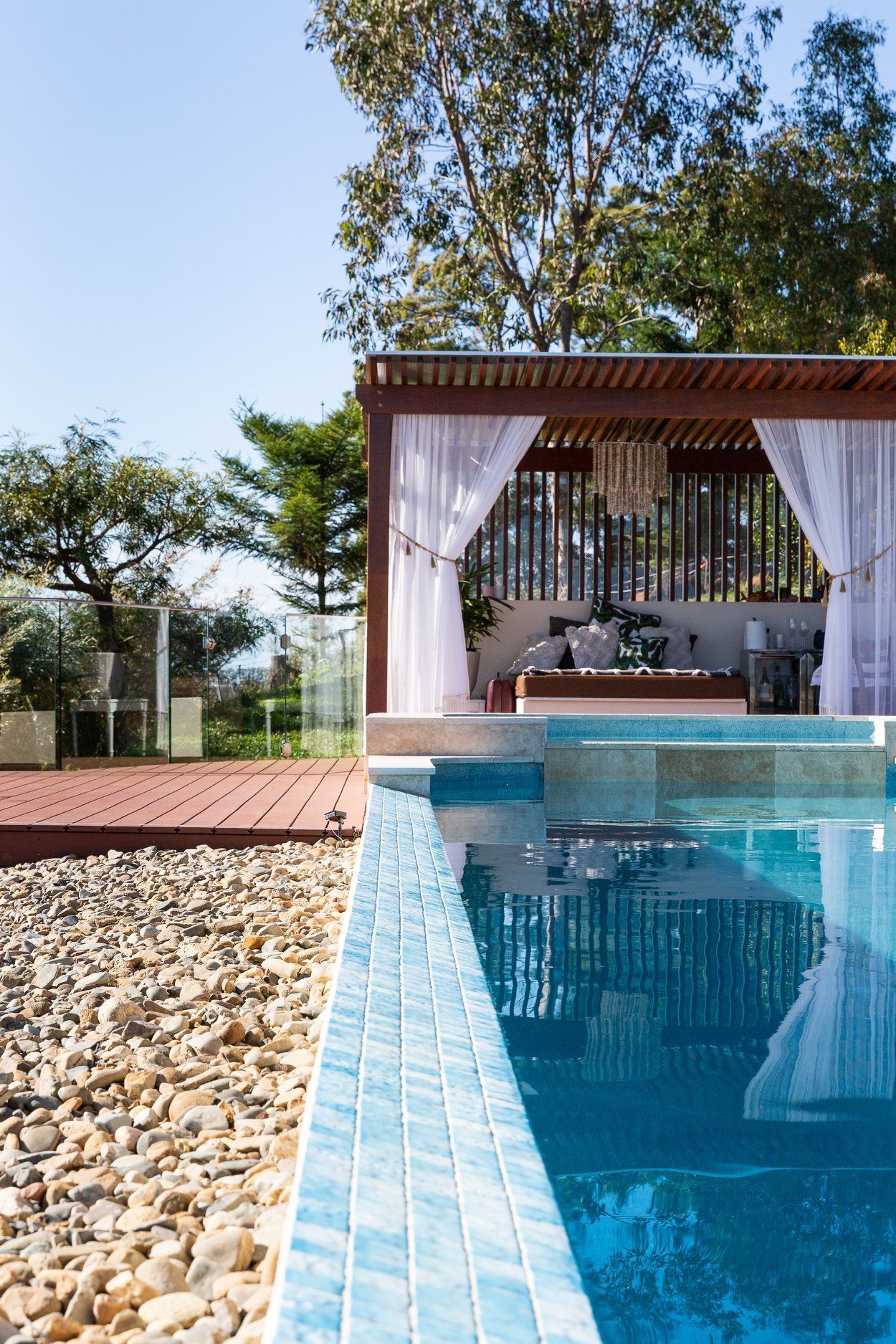 A Swimming pool with a Gazebo in the Background — Profile Pools & Landscaping In Byron Bay, NSW
