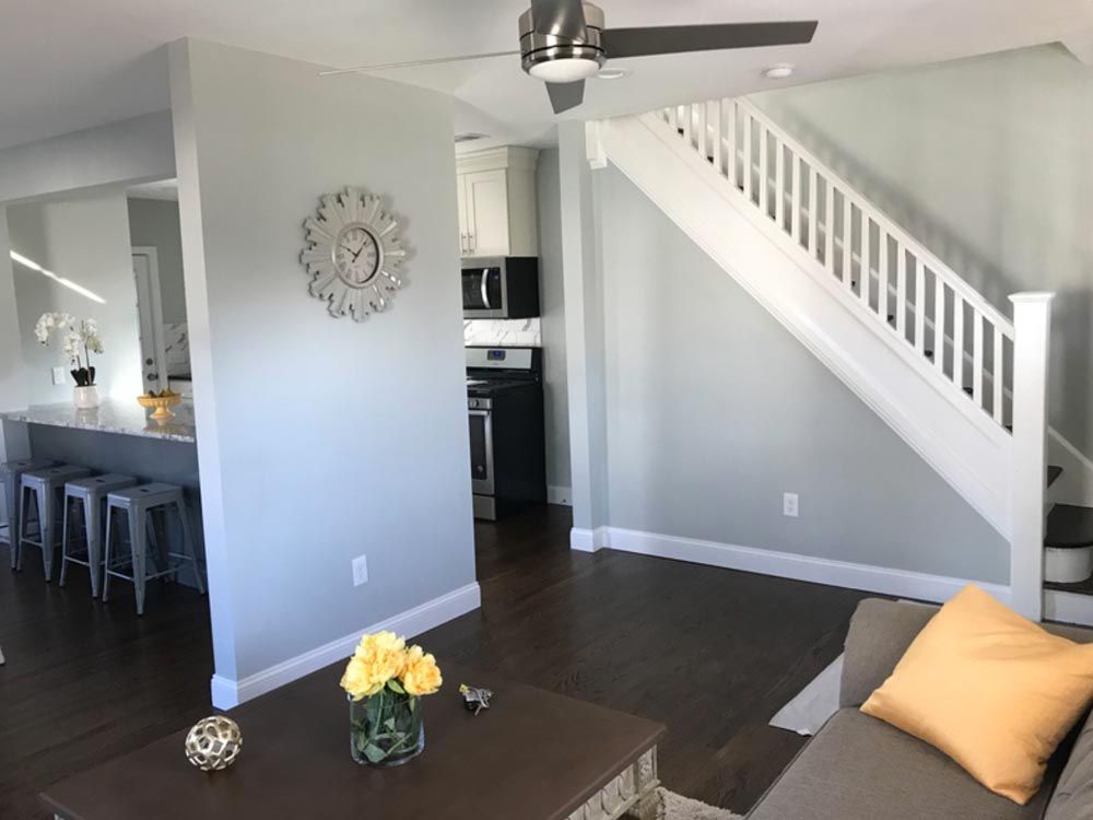 Beautifully renovated open-concept living area with modern finishes by DMF Construction in Scotch Plains, NJ