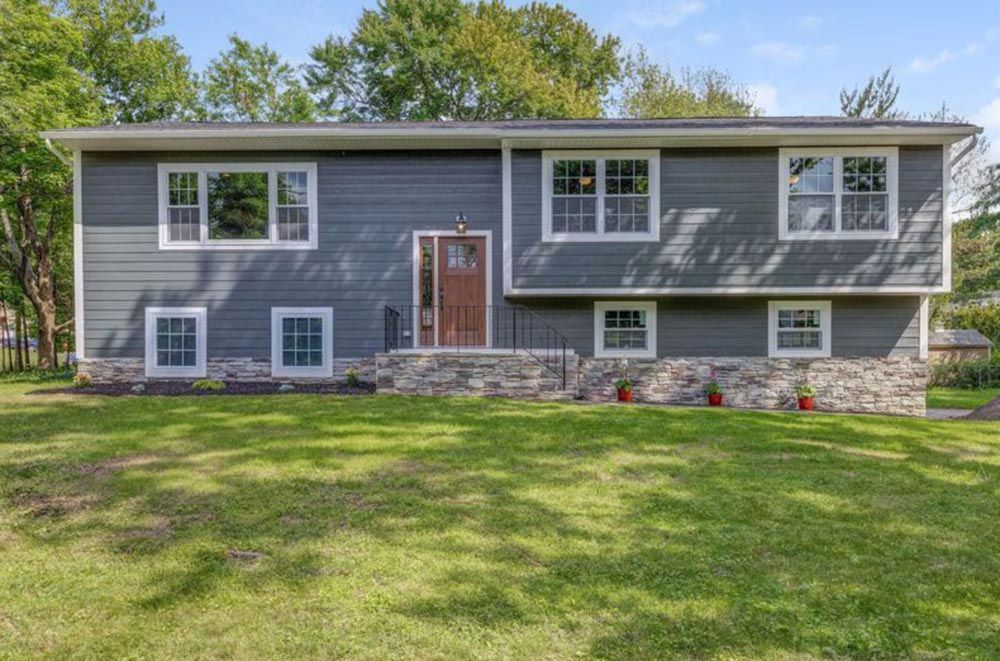 Completed roof replacement project on a residential home in Westfield, NJ by DMF Construction