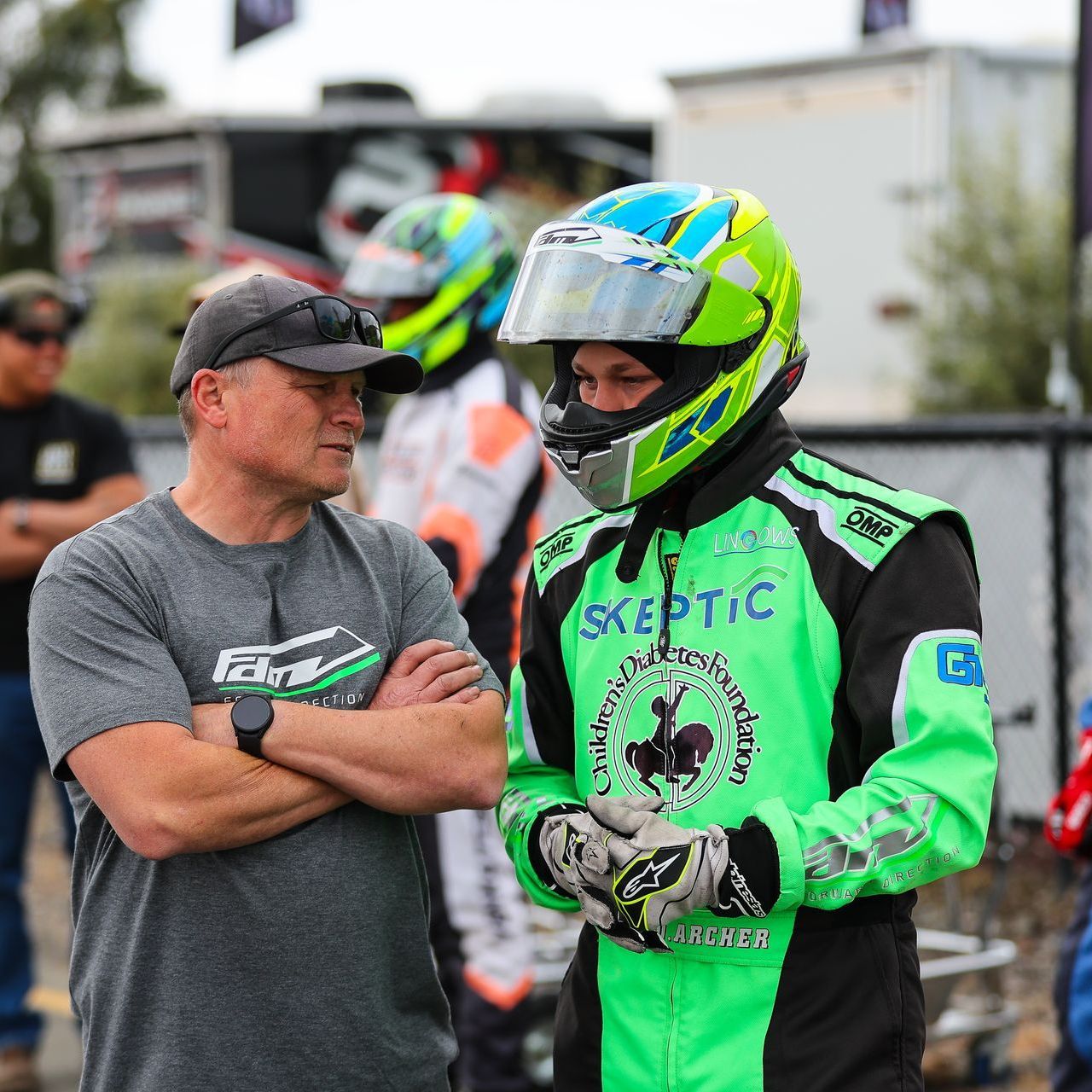 A person wearing a helmet that says arai on it
