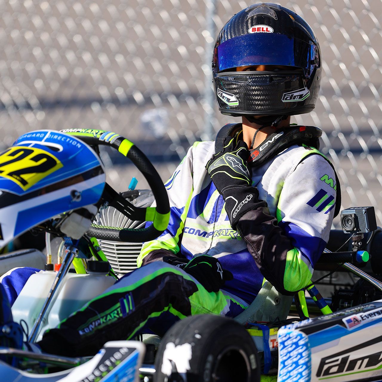 A race track with a checkered flag that says kart chaser