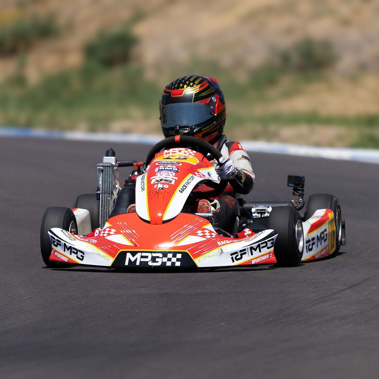 A go kart with the number 5 on it
