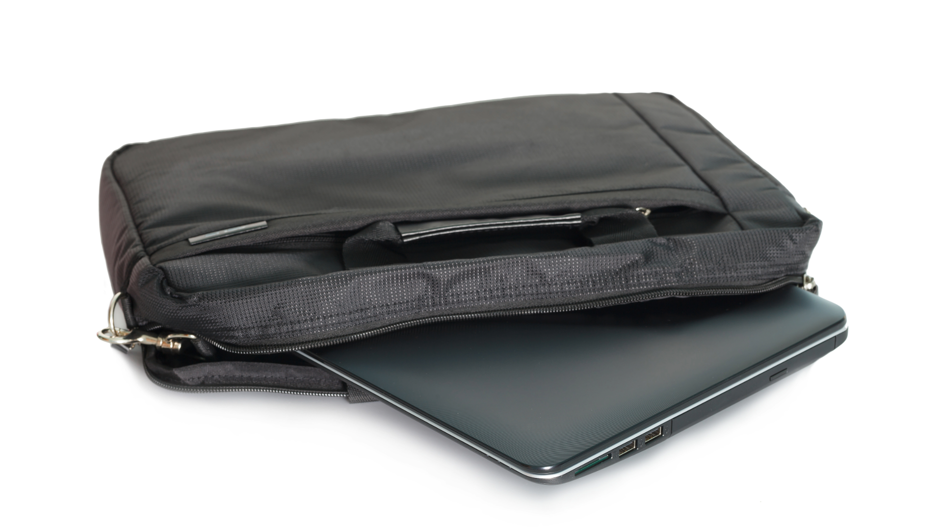 Black laptop in a partially open black laptop bag on a white background.