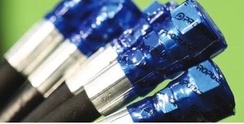 a close up of a hose with blue tape on it a close up of a hose with blue tape on it