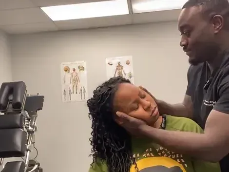 Dr. Sackey with a patient