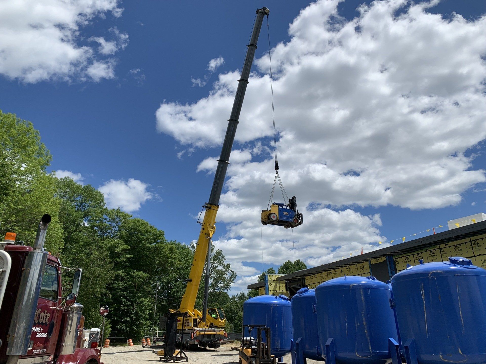 Crane Moving a Vehicle