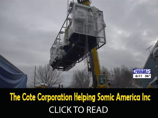 Crane construction over modern building