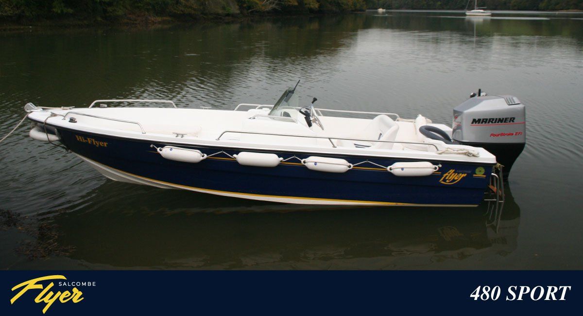 Blue and white motorboat