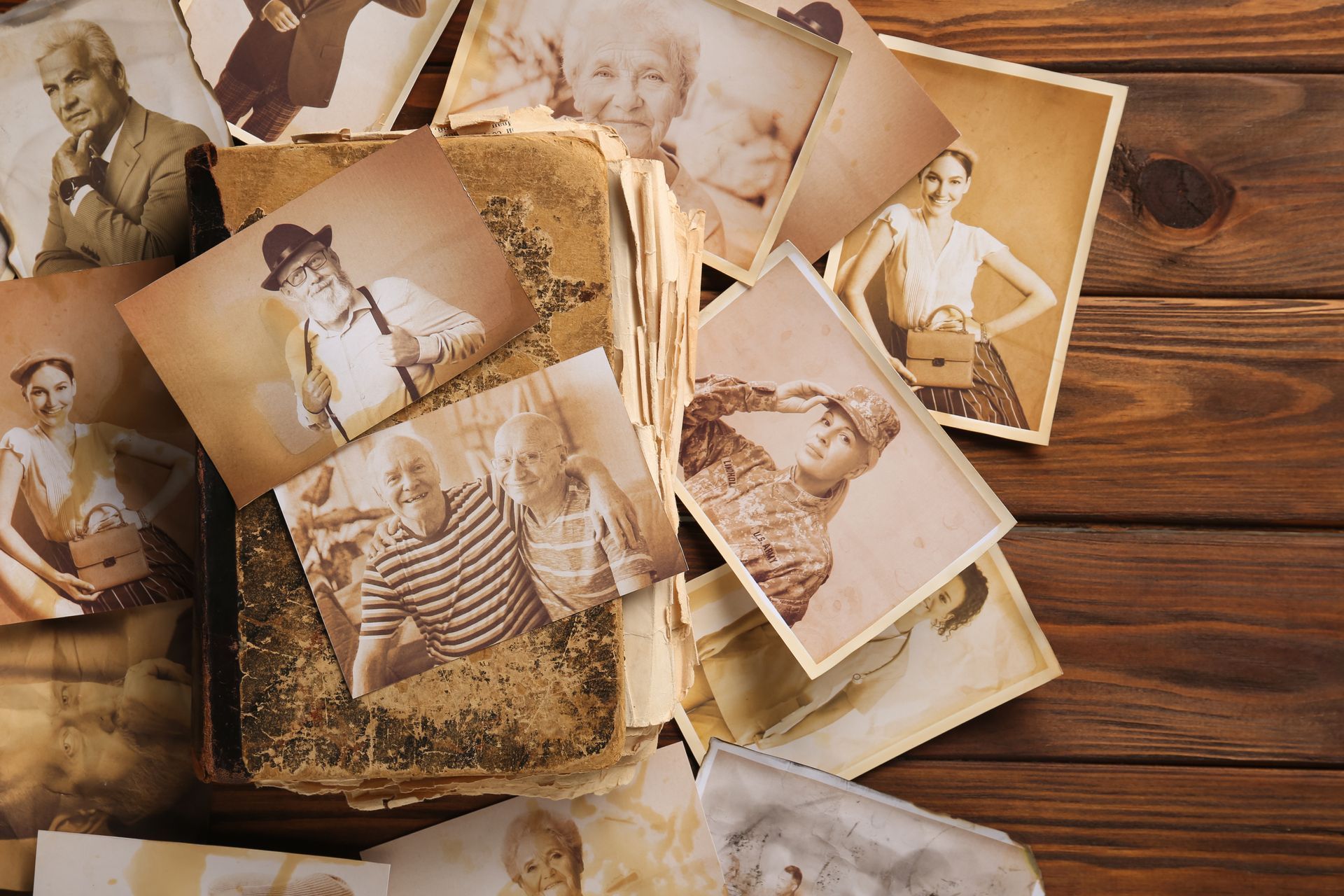 A person is taking a picture of a man and a boy in a photo album.