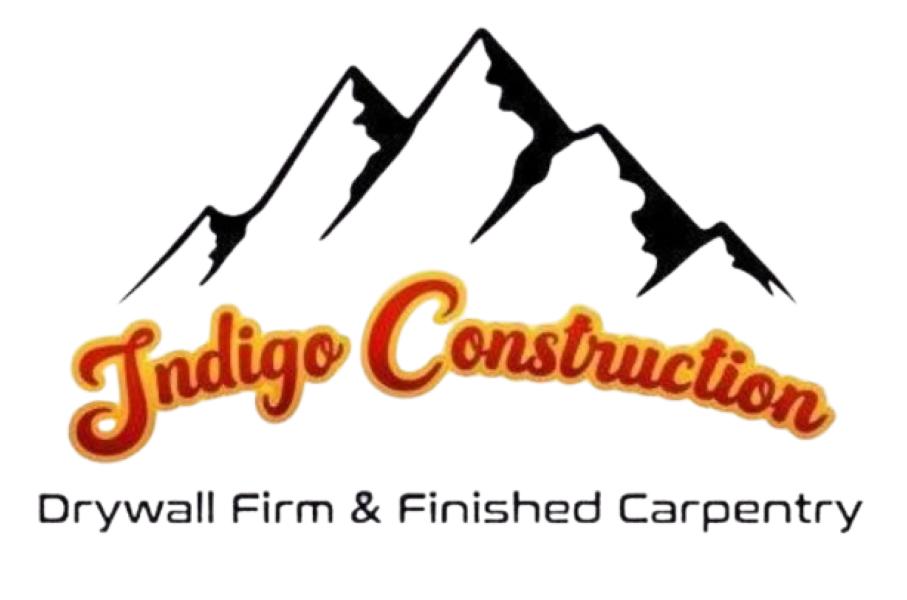 Indigo Construction logo with mountain peaks and the text “Drywall Firm & Finished Carpentry”