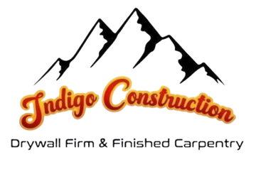 Indigo Construction logo with mountain peaks and the text “Drywall Firm & Finished Carpentry”