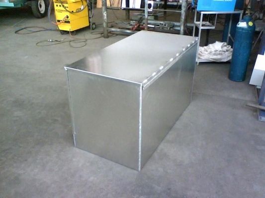 Rectangular metal box, silver, on a concrete floor in a workshop setting. — R&M Sheetmetal Nowra Metal Roofing in South Nowra, NSW