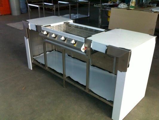 Stainless Steel Commercial Kitchen Cooking Station With a White Counter — R&M Sheetmetal Nowra Metal Roofing in South Nowra, NSW