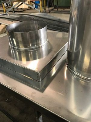 Metal Ventilation Components on a Stainless Steel Surface — R&M Sheetmetal Nowra Metal Roofing in South Nowra, NSW