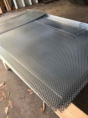 Metal Sheets With Small Holes Stacked — R&M Sheetmetal Nowra Metal Roofing in South Nowra, NSW