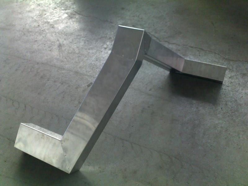 A Piece of Metal Is Laying on A Concrete Surface — R&M Sheetmetal Nowra Metal Roofing in South Nowra, NSW